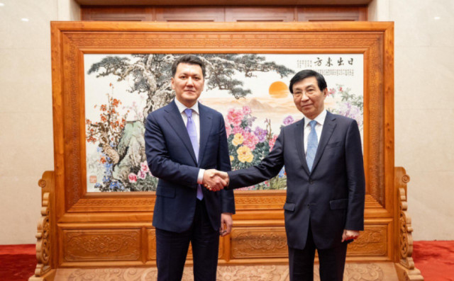 Kazakh delegation led by State Counselor attends events in China